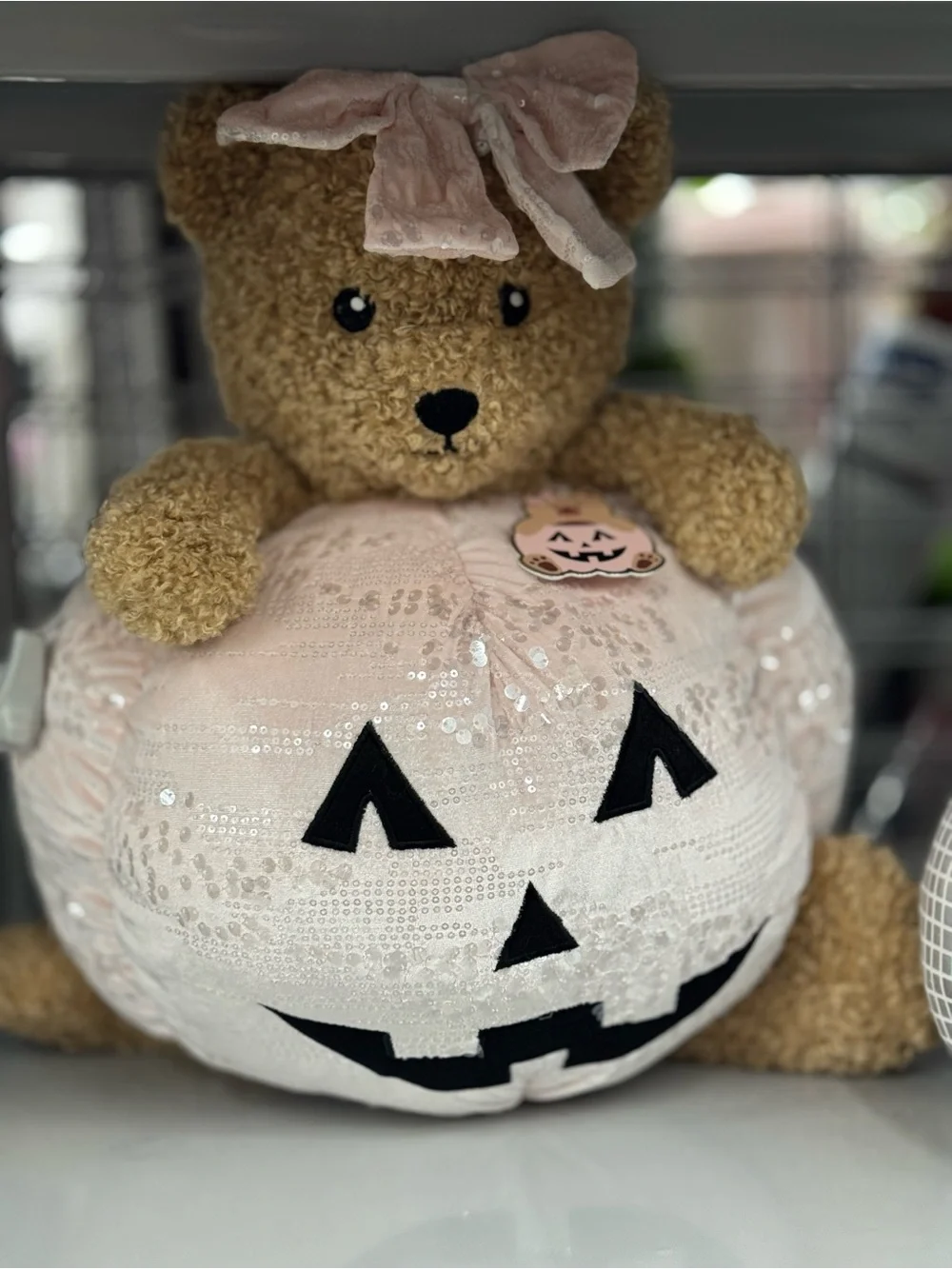 Bear Holding Pink Sequin Jack-O'-Lantern Pillow